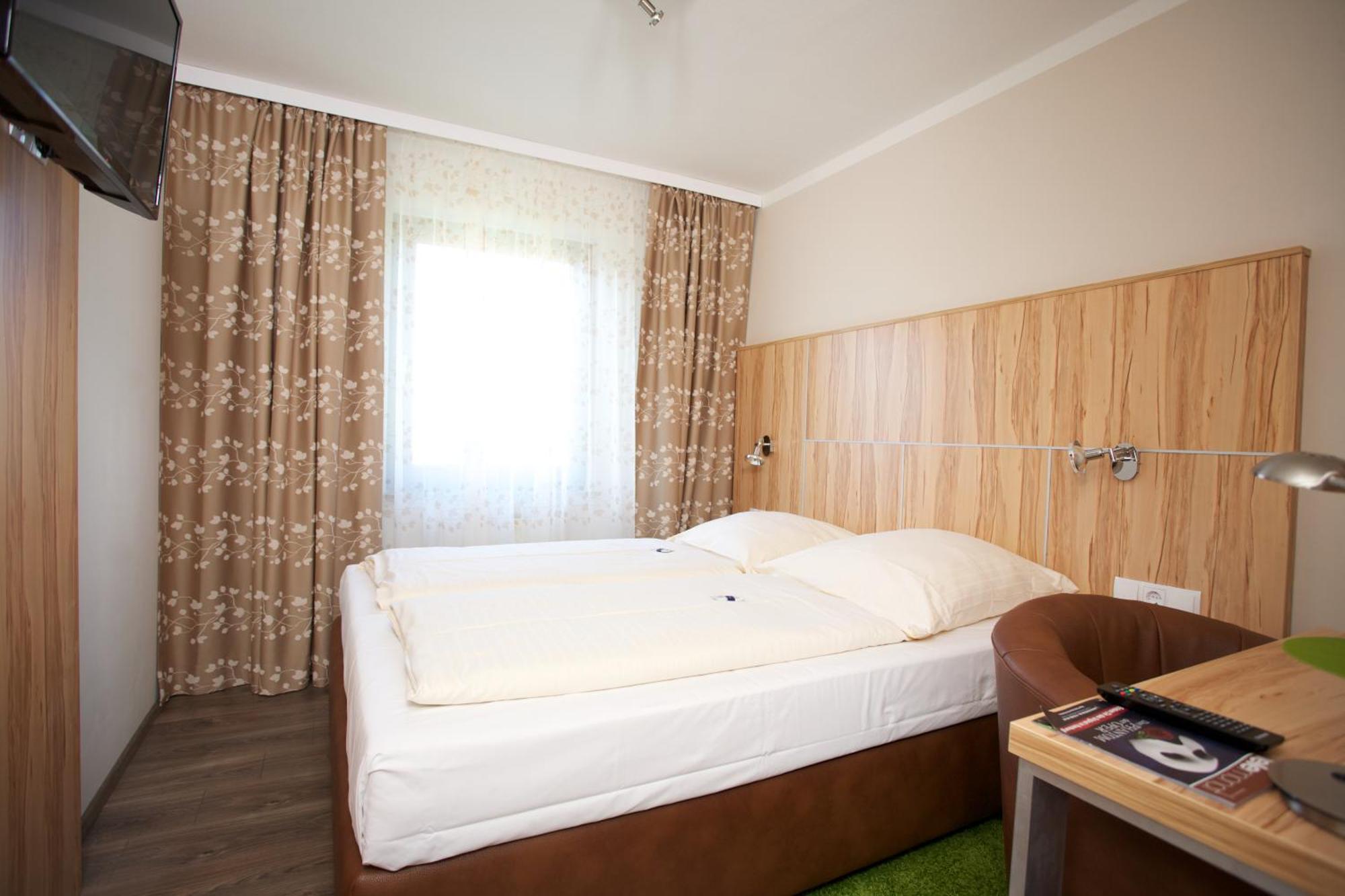 Hotel Reinhardtshof Garni Wolfschlugen Cameră foto
